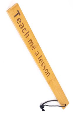 Падл Fetish Tentation — Paddle Teach me a lesson Bamboo, упакований у ПЕ пакет